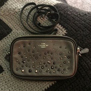 Coach crossbody clutch metallic black star rivets